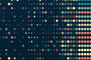 Pallini colorati su sfondo scuro. Immagine di copertina della ricerca di Percorsi di Secondo Welfare sulla Ricerca sulla Data Philanthropy